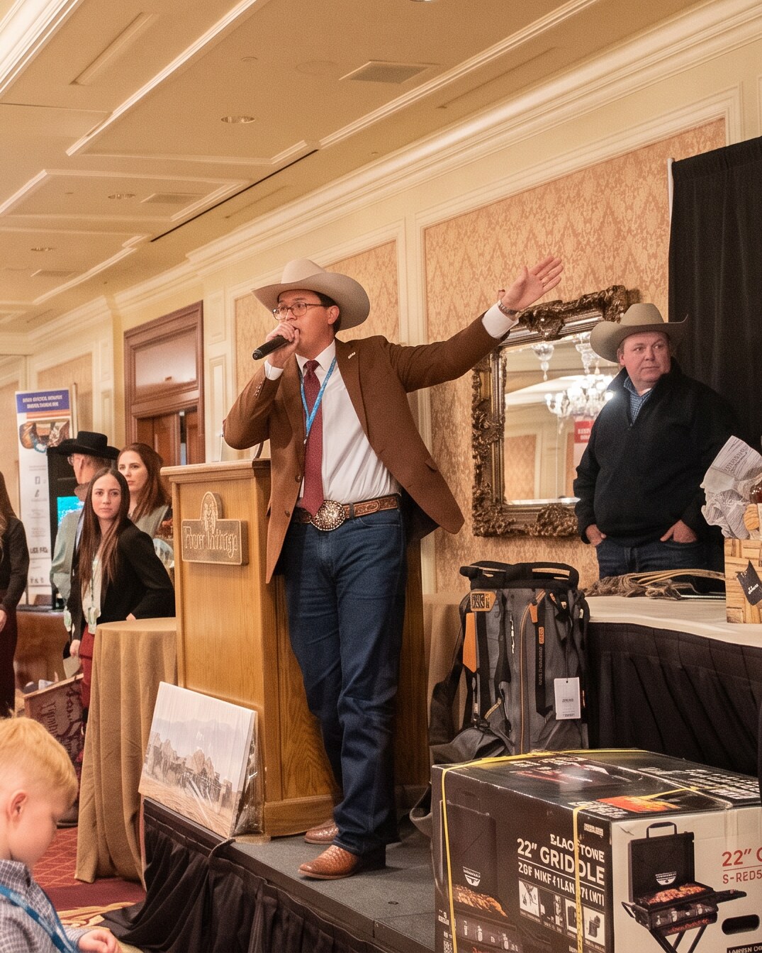 Auctioneer in a grand gala room